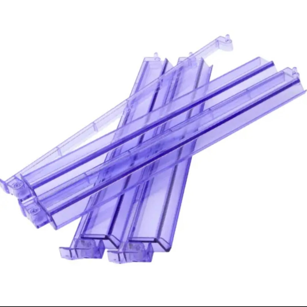 Four translucent lavender Mahjong racks in an overlapping arrangement