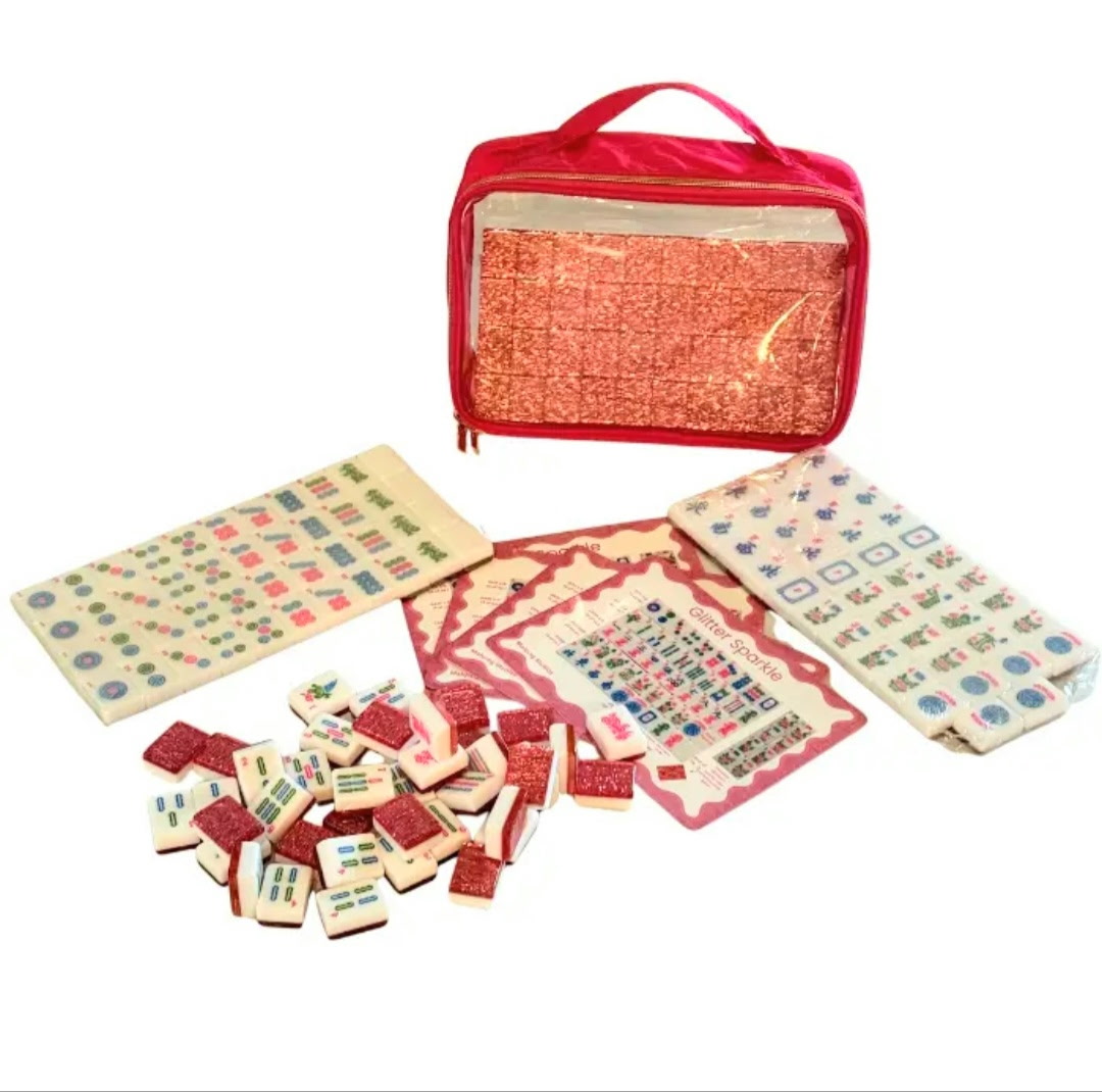 Pink glitter Mahjong set with tiles, carrying case, reference cards, and accessories